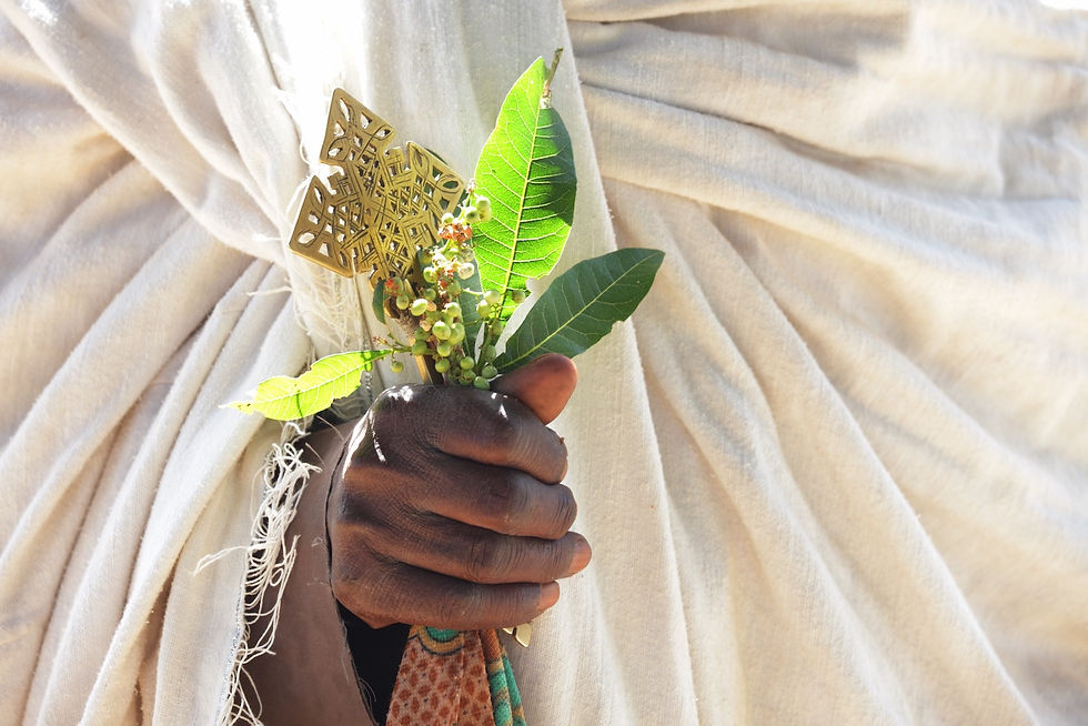 Ethiopian Orthodox priest holds a cross