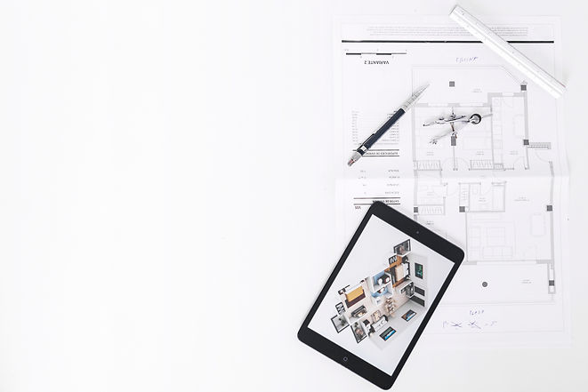 drafting-tools-near-tablet-blueprints.jpg