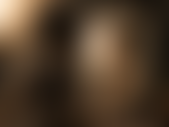 A beastly woman with dark curly fur covering her body, looking into a mirror and sees a beautiful human woman staring back.