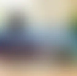 Elderly individuals collaboratively work on a puzzle in a supportive setting, highlighting the theme of understanding autism in adults and the importance of recognizing late diagnoses.