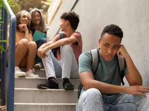 A person who suffers from introversion and does not like to mix with friends