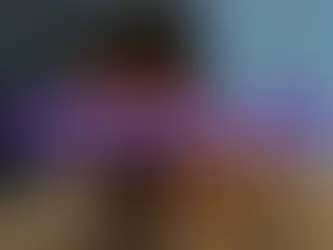 A person sits with hands on their head, reflecting feelings of stress or anxiety. The image highlights the importance of improving daily routines to manage Generalized Anxiety Disorder.