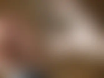 A person holds a glass of water and a few pills, highlighting the struggle and complexity of substance abuse.