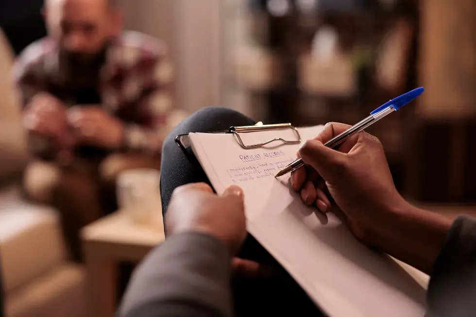 psychologist taking notes.webp