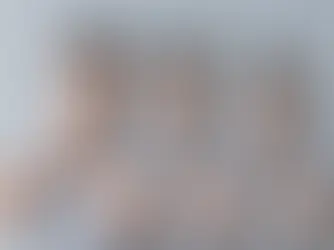 A man stands with his hands covering his face, while multiple blurred images of him suggest emotional turbulence, symbolizing misconceptions about bipolar disorder.