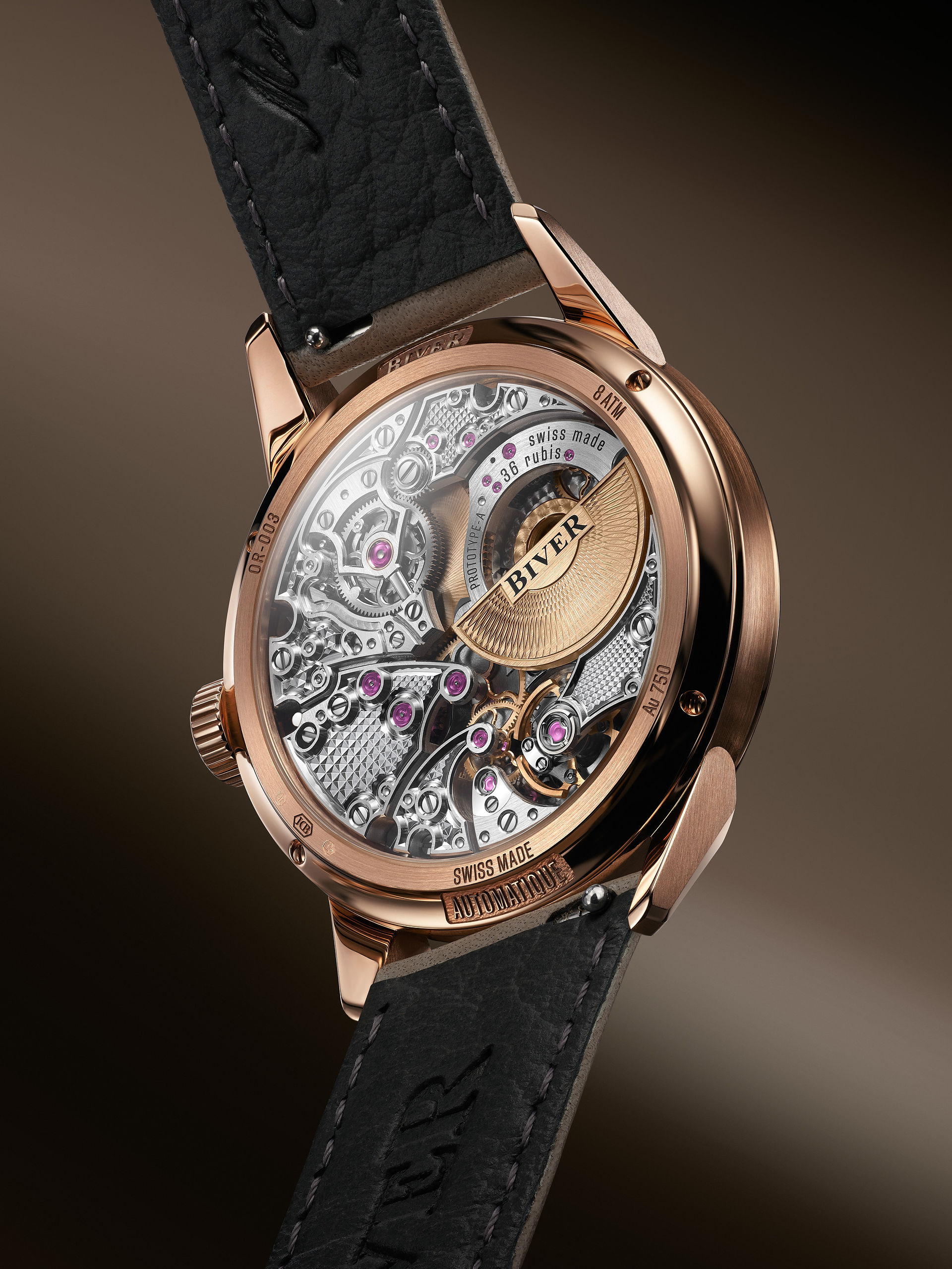 Each 18k gold dial features a mix of finishes and an applied 18k gold railraod track for added depth and texture.
