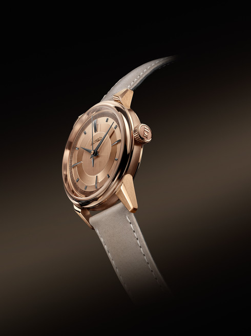 Each 18k gold dial features a mix of finishes and an applied 18k gold railraod track for added depth and texture.
