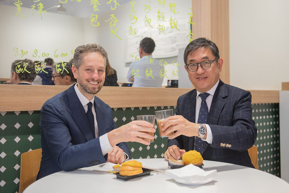 Dane and Noah enjoying the food at Cha Chaan Teng ©Courtesy Hong Kong Tourism Board