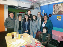 Members of the Haecker lab in a restaurant