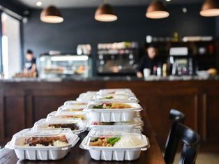 Plastic takeout food containers with tight lids used for delivery orders