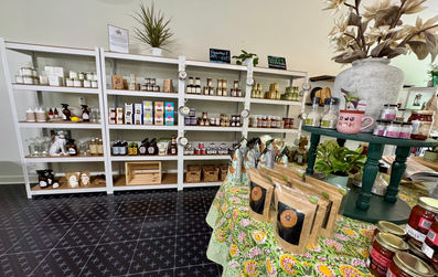 Items on shelves in the middle of the store-Cheers, My Dear