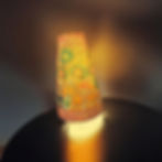 Handpainted leather lamp with vibrant elephant design, traditional Indian Tholu Bommalata art