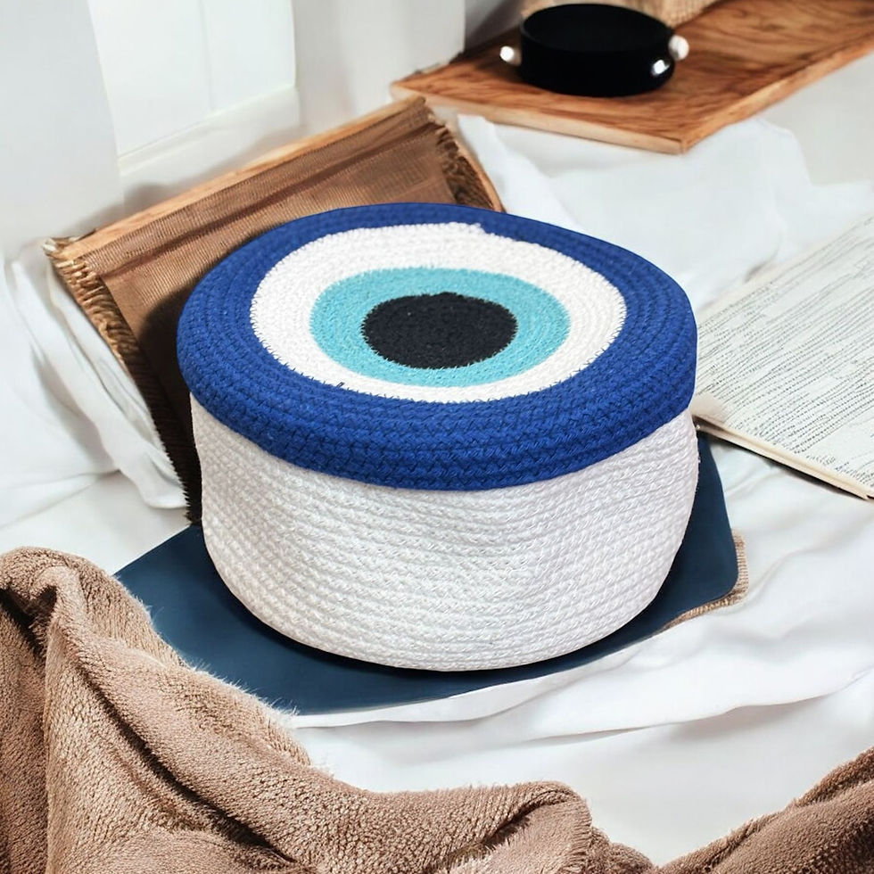 Handwoven jute basket with blue evil eye (nazar) design, 5x9 inches, eco-friendly home decor by Qala by Arpit.