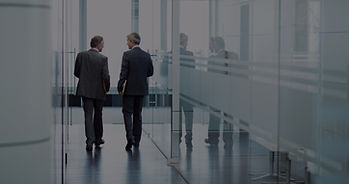 Business Meeting of Two Men Walking in the Hall_edited.jpg