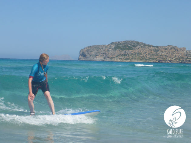 surfing green waves in Falassarna