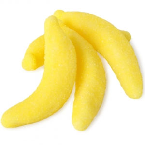 Three yellow gummy banana candies