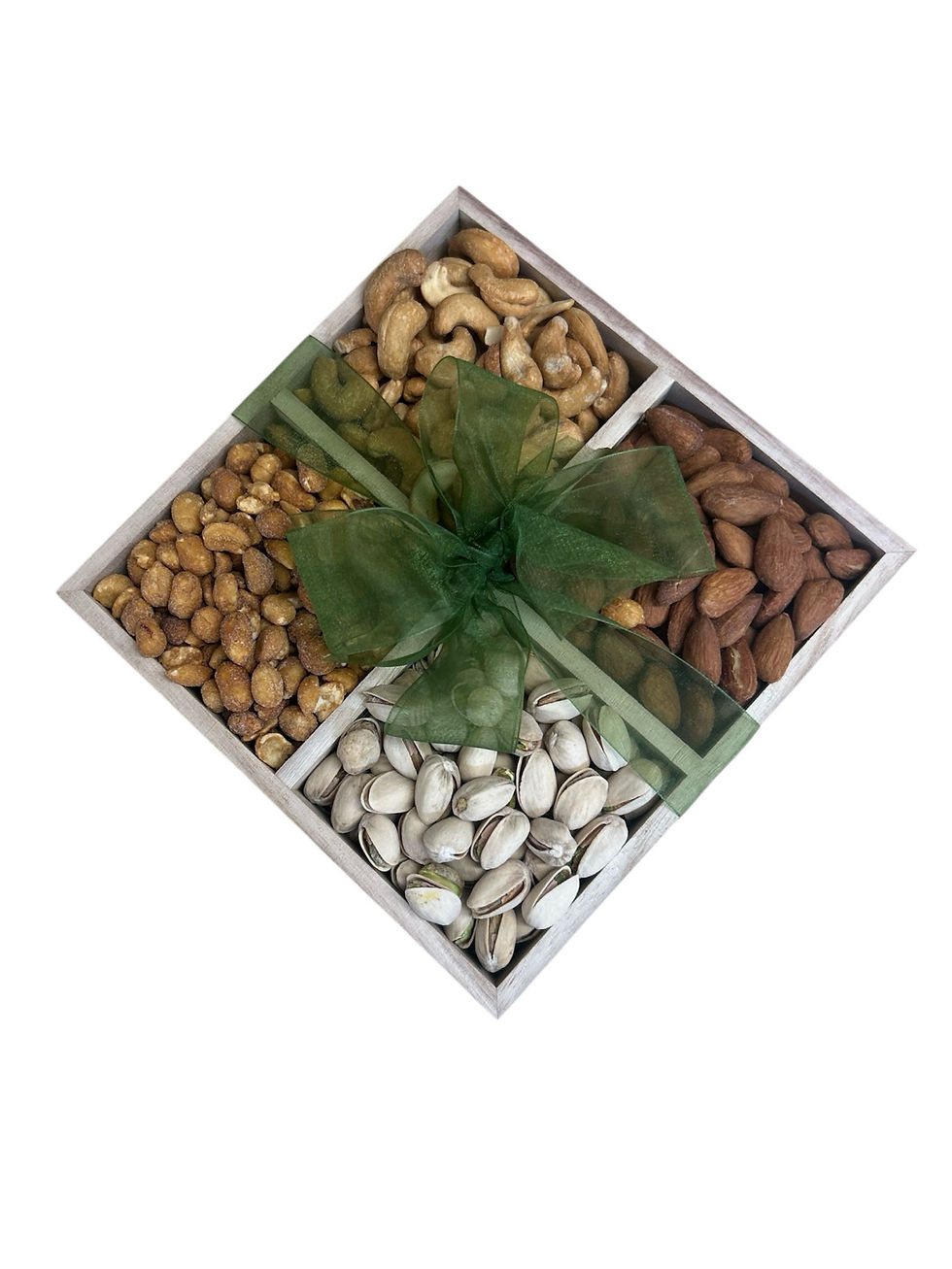 Tray of mixed nuts, with green bow, on a white background.