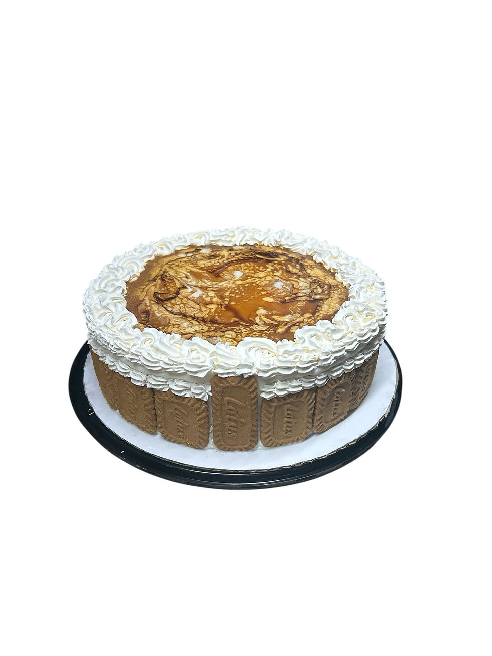 Delicious cake with white frosting and toppings on a simple white background.