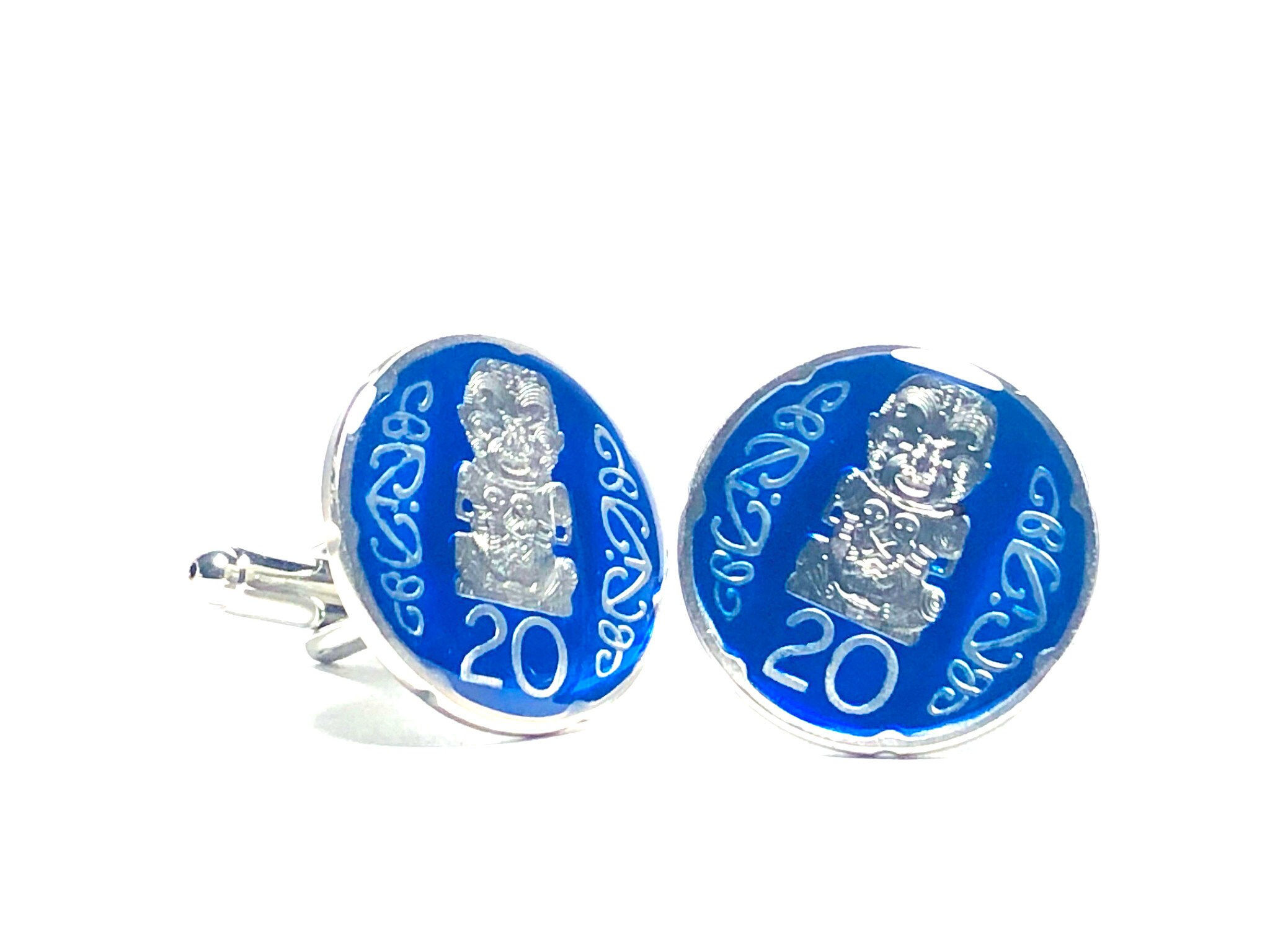 New Zealand coin cufflinks 20 cents Maori carving depicting Pukaki