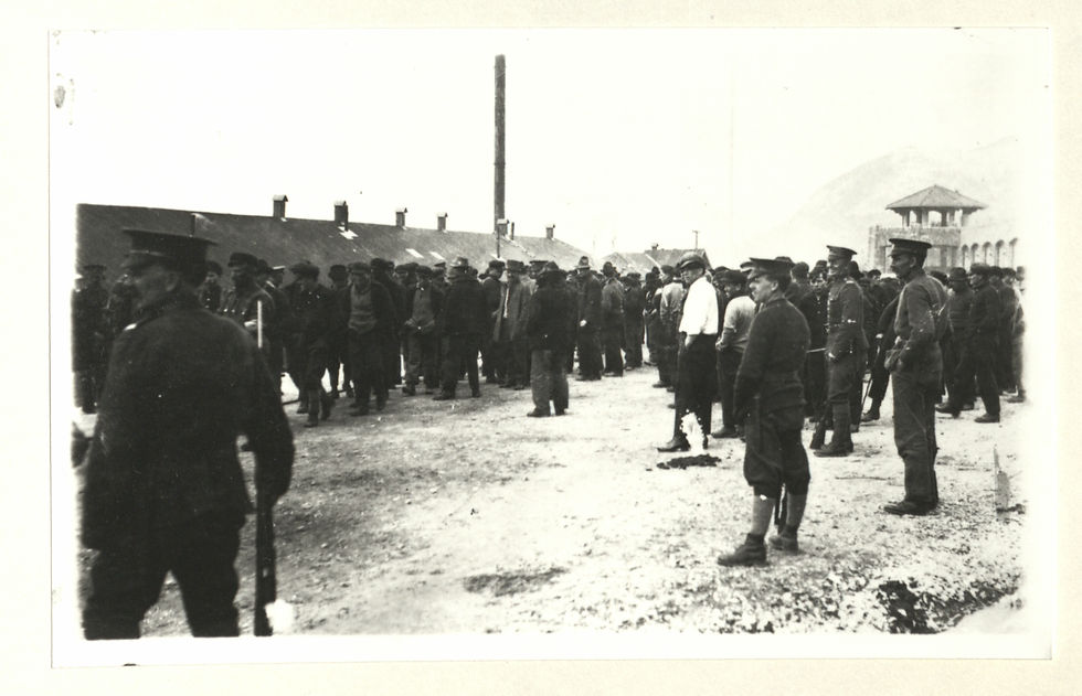 Figure 2: Prisoners. Going into Compound., ca. 1915-1917, The Whyte, William D. Buck fonds, V295/LC/PD/45 accn. 6666