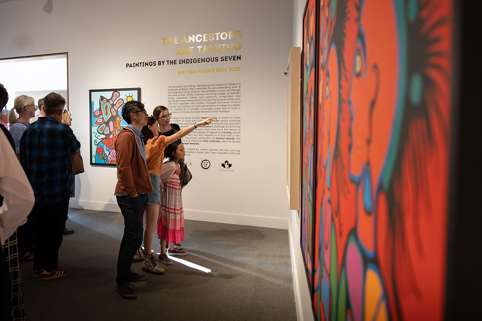 Guests at the summer exhibition opening of The Ancestors Are Talking.
