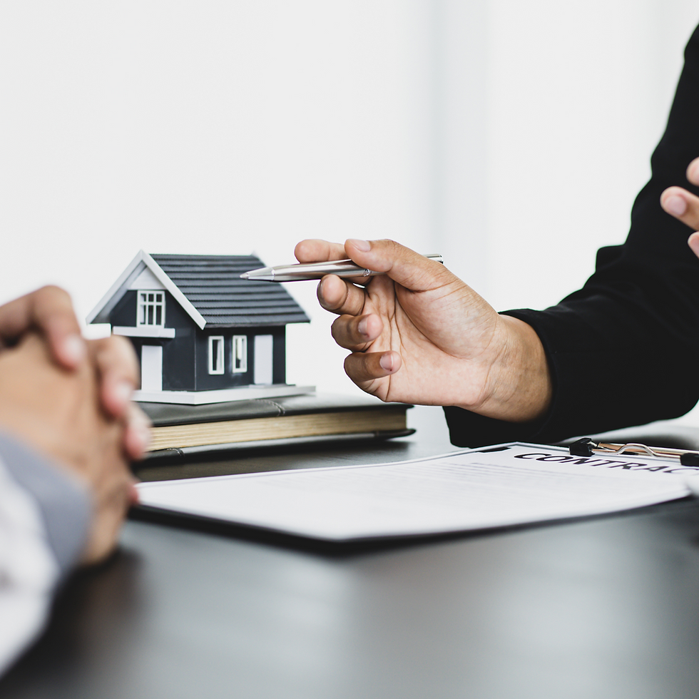 Agent discussing home purchase contract