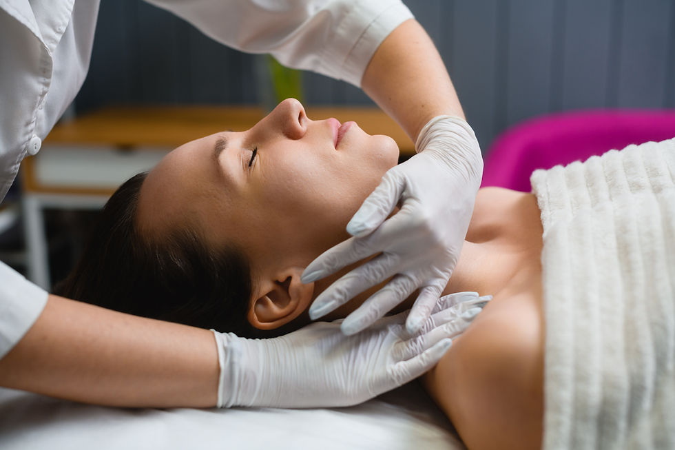 Woman receiving TMJ massage therapy, Sydney Allied Health