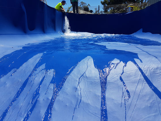 Bendigo Pool Teck team cleaning and maintaining pool