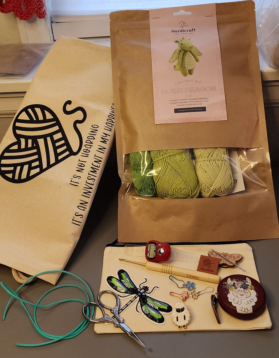 Thumbnail: Purls n Potions kit with Amigurumi set, project back, pencil case, scissors measuring tape, Handmade label, crochet hook, pin