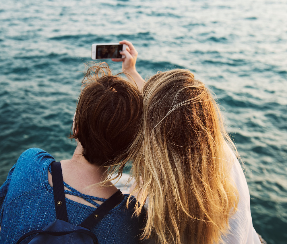 Friends taking photos