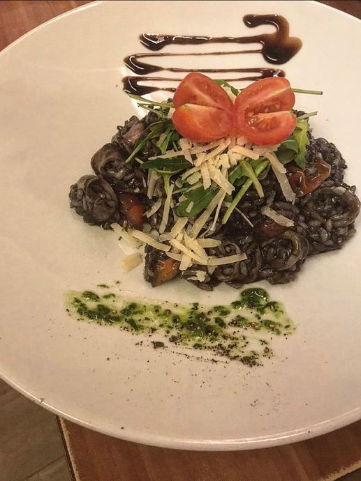 Risotto Nero sepia
Reis mit Tintenfisch