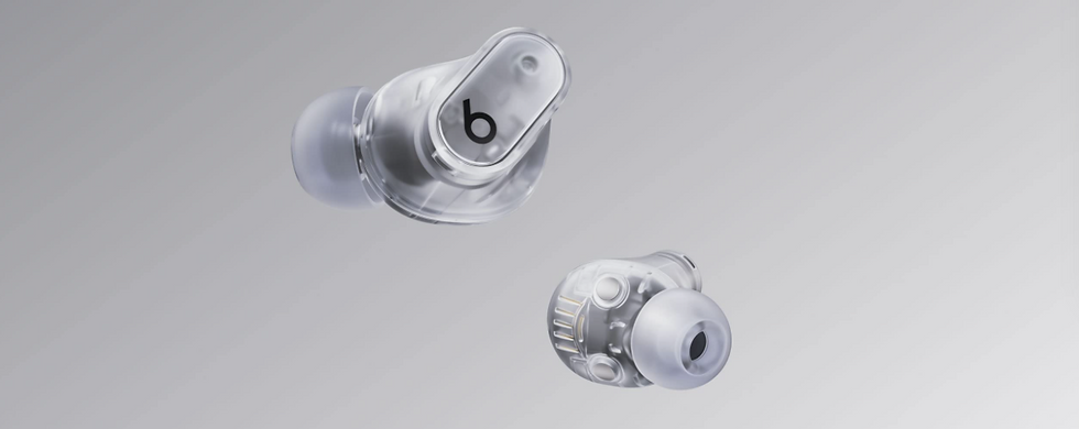 transparent Beats In - Ear headphones floating around