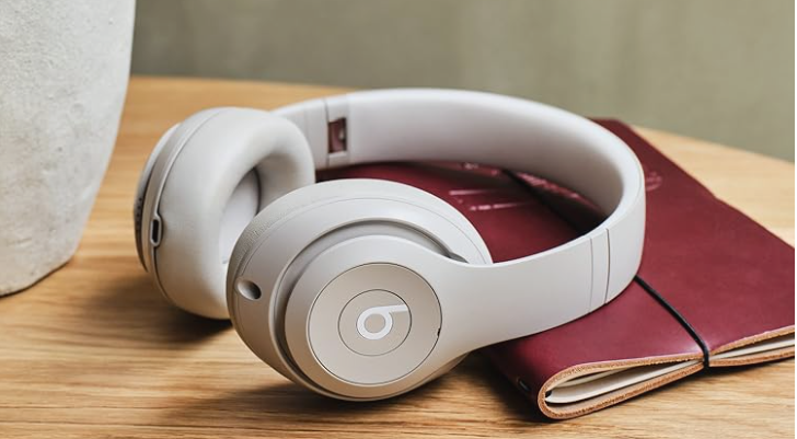 Beats Solo On-Ear Headphones resting on a book