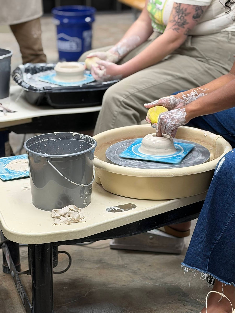 A potter working at the wheel