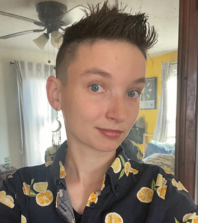 Photo of NEUC Advisory Board Member Skyler (they/them) who is NEUC's Conference Coordinator