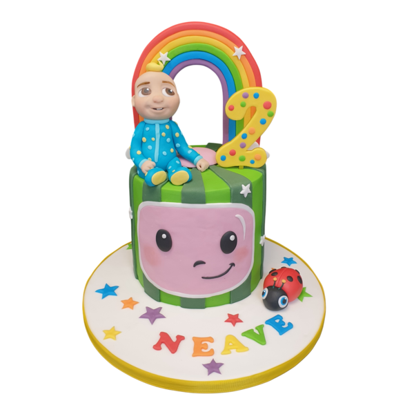 A vibrant and colourful CocoMelon themed cake with fondant decorations showcasing characters from the popular children's show. Perfect for a themed birthday celebration.