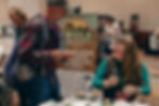 HMI Program Manager enjoying some camaraderie with conference participants at the HMI tradeshow booth at the conference. PC: REGENERATE Conference.