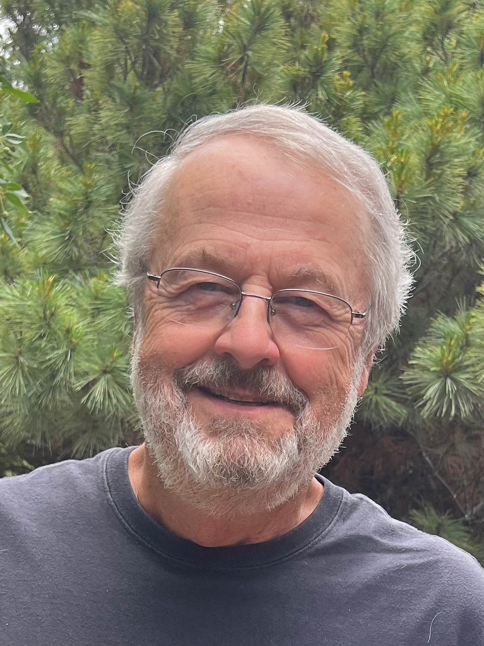 Man with beard and glasses