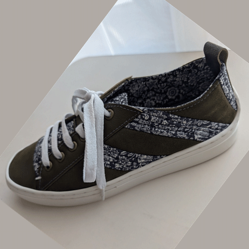 Cheryl's leather and canvas sneakers, side view