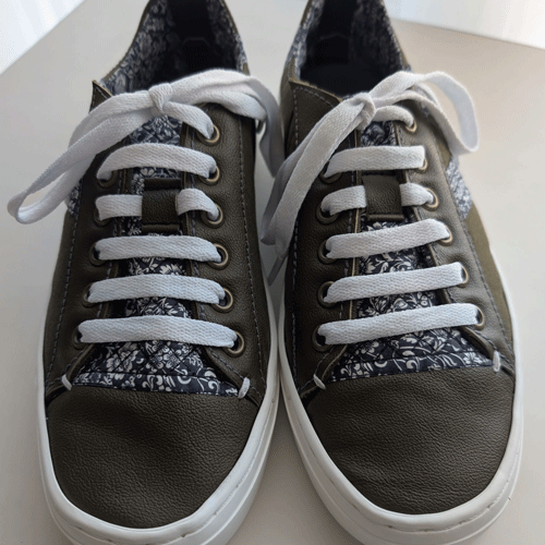 Cheryl's leather and canvas sneakers, front view