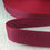 Thumbnail: burgundy polypropylene webbing pulling off of roll
