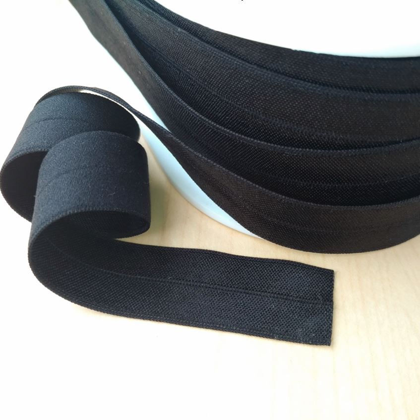 Thumbnail: ½" black foldover elastic shown with trim bolt end