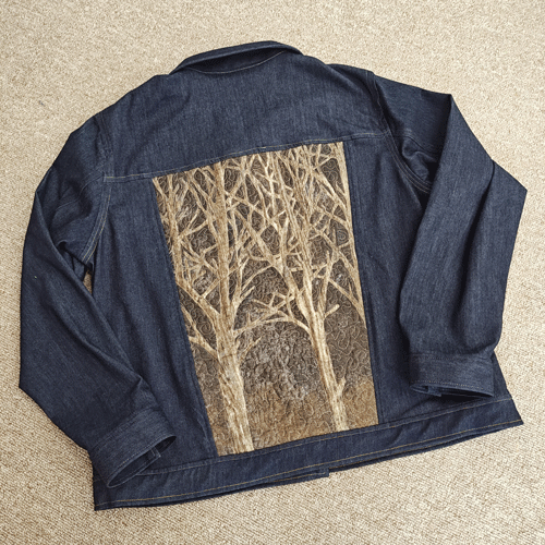 Brenda's jean jacket with embellished back panel, back view