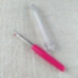 Thumbnail: close up of hot pink seam ripper, cap off