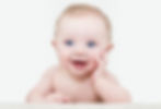 Beautiful smiling surprised baby