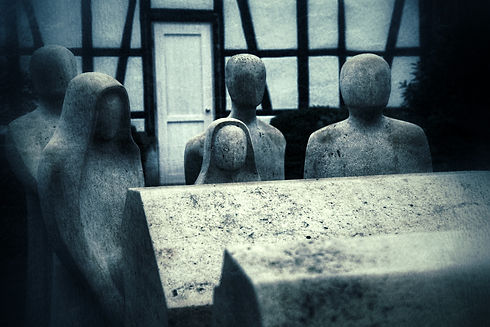 vecteezy_retro-grunge-people-no-face-and-rip-coffin-sculpture_3196265.jpg