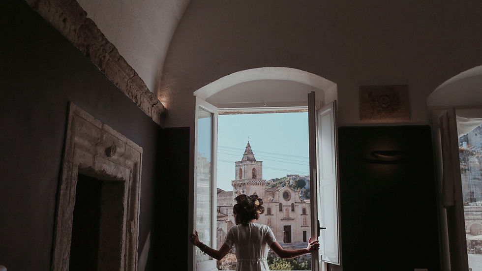 Eye-level view of a rustic wedding venue in Puglia with olive trees