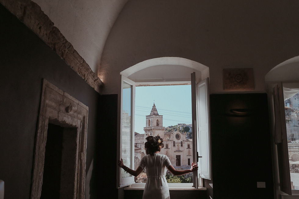 Eye-level view of a rustic wedding venue in Puglia with olive trees