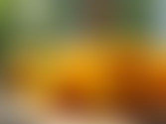 Yellow capsicums on table