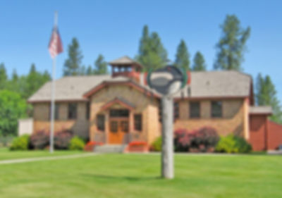 The Old Schoolhouse with flag 